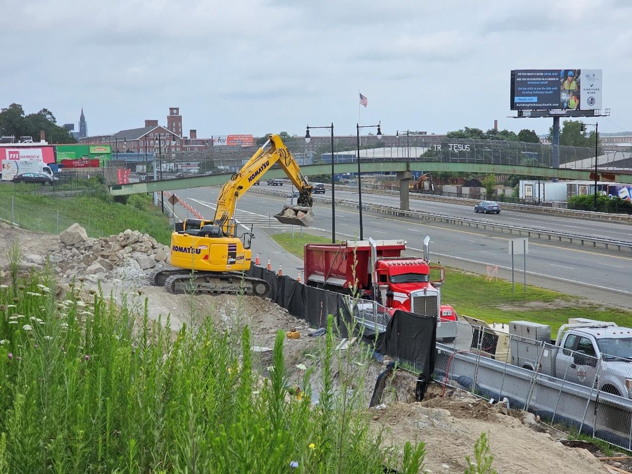 Photograph of MBTA South Coast Rail Project, Loading out excavated and hammered rock.